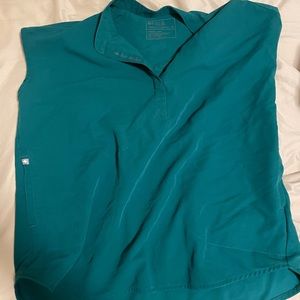 Figs scrubs like new! Barely worn size M in this beautiful spring color:)